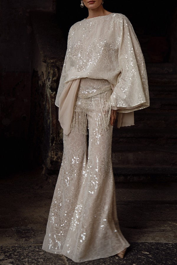 NIDODILEDA DREAM FRINGED FLARES OFF WHITE